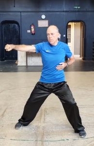 Ben Milton in Tai Chi posture